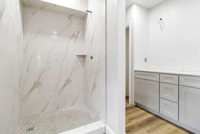 43 Pine St, Taunton, MA 02780 - full bath with a marble finish shower, wood finished floors, and vanity