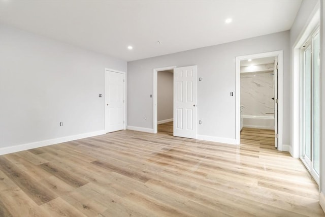 43 Pine St, Taunton, MA 02780 - unfurnished bedroom with recessed lighting, light wood-style floors, baseboards, and ensuite bath