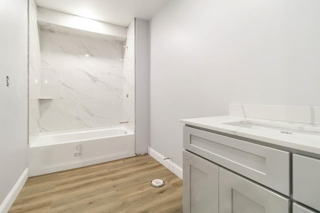 43 Pine St, Taunton, MA 02780 - full bathroom featuring vanity, baseboards, wood finished floors, and  shower combination