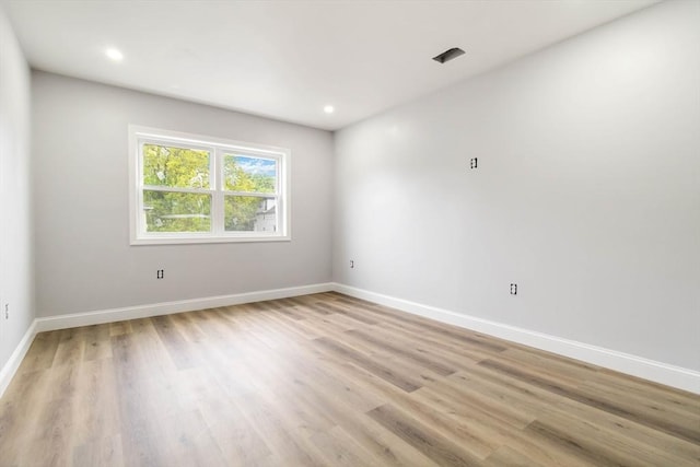 43 Pine St, Taunton, MA 02780 - empty room with light wood finished floors, baseboards, and recessed lighting