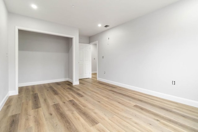 43 Pine St, Taunton, MA 02780 - unfurnished bedroom with recessed lighting, baseboards, light wood finished floors, and a closet
