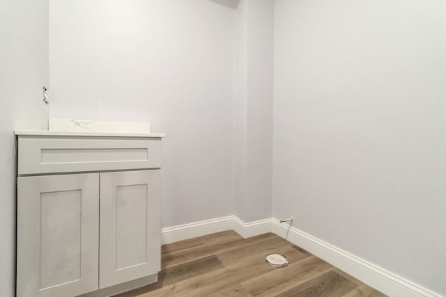 43 Pine St, Taunton, MA 02780 - laundry area featuring light wood-style floors and baseboards