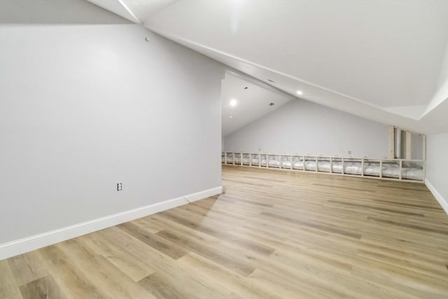 43 Pine St, Taunton, MA 02780 - additional living space with lofted ceiling, recessed lighting, light wood finished floors, and baseboards