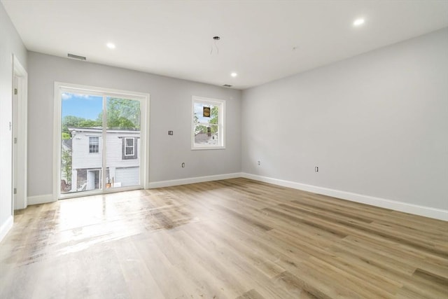 43 Pine St, Taunton, MA 02780 - unfurnished room with baseboards, light wood-style flooring, and recessed lighting