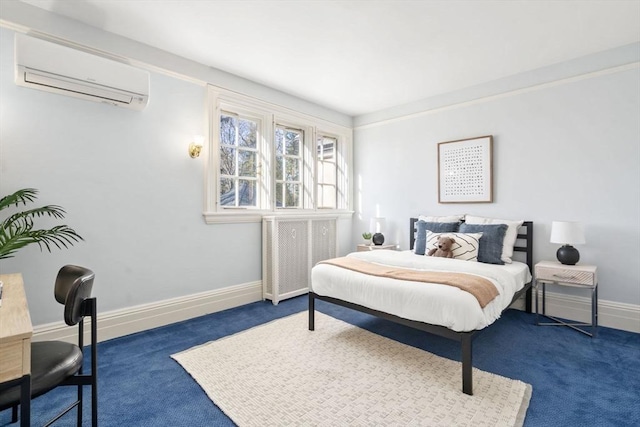 carpeted bedroom with a wall unit AC