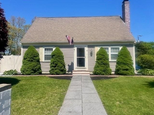 2 Spinning Brook Rd, Yarmouth, MA 02664 - cape cod home with a chimney and a shingled roof