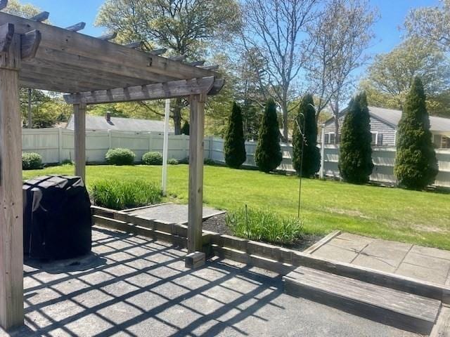 2 Spinning Brook Rd, Yarmouth, MA 02664 - view of patio with a pergola and area for grilling