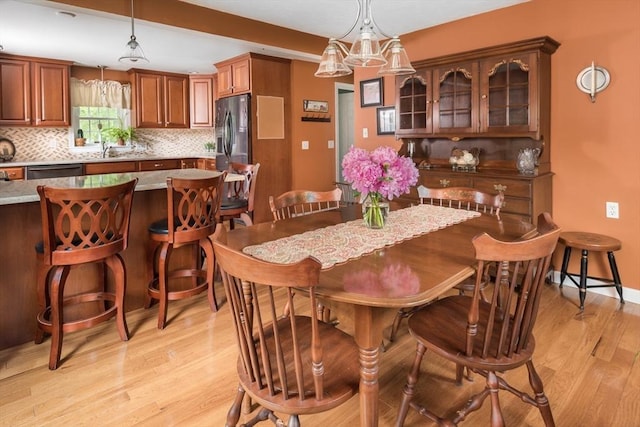 33 Cranberry Rd, Whitman, MA 02382 - dining space featuring light wood-style floors and baseboards