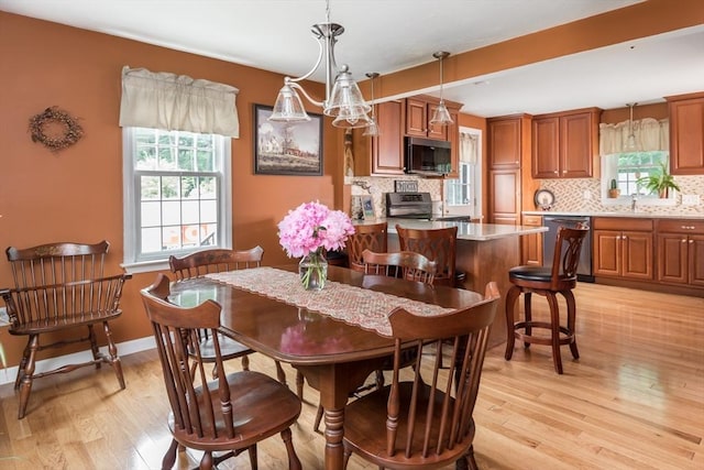33 Cranberry Rd, Whitman, MA 02382 - dining area featuring light wood-style flooring