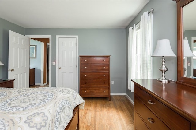 33 Cranberry Rd, Whitman, MA 02382 - bedroom featuring baseboards and light wood finished floors