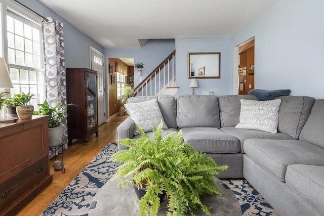 33 Cranberry Rd, Whitman, MA 02382 - living area with stairs and light wood-style flooring