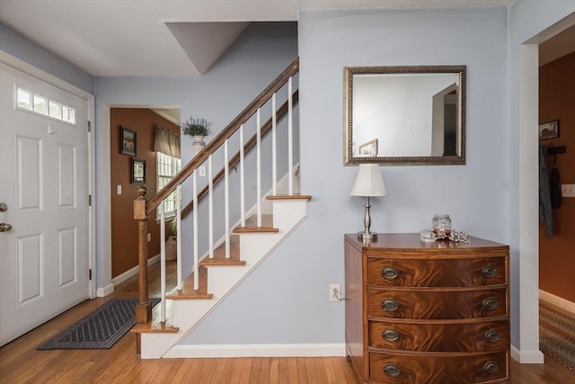 33 Cranberry Rd, Whitman, MA 02382 - foyer entrance featuring wood finished floors, stairs, and baseboards