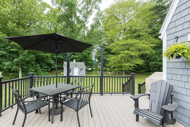33 Cranberry Rd, Whitman, MA 02382 - wooden terrace with outdoor dining space, a yard, and view of wooded area