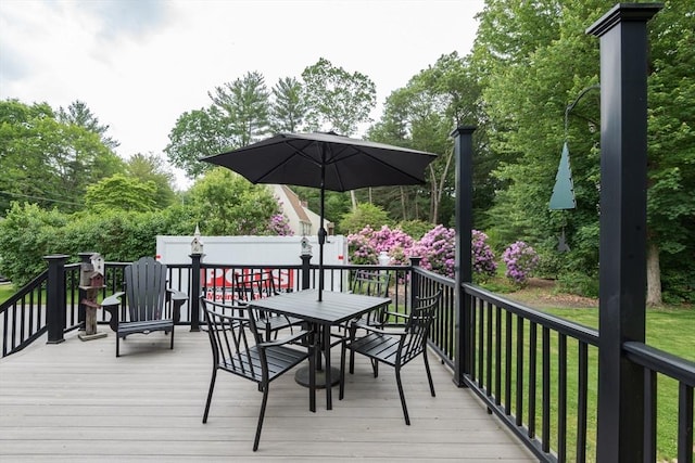 33 Cranberry Rd, Whitman, MA 02382 - wooden deck featuring outdoor dining space and a lawn