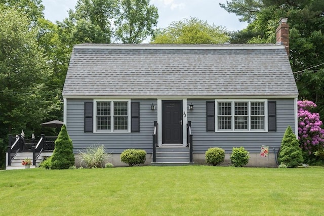 33 Cranberry Rd, Whitman, MA 02382 - dutch colonial featuring roof with shingles, a chimney, and a front lawn