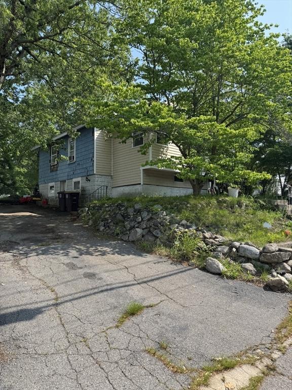 817 Middle St, Weymouth, MA 02188 - view of side of home featuring asphalt driveway