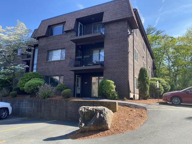 7 Thomas St Unit J16, Saugus, MA 01906 - view of property featuring uncovered parking