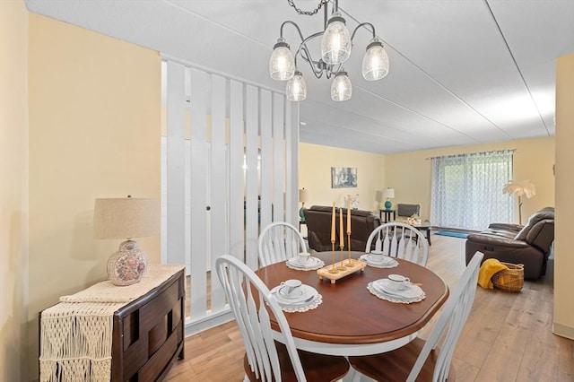 65 Commons Dr Unit 603, Shrewsbury, MA 01545 - dining area with a chandelier and light wood finished floors