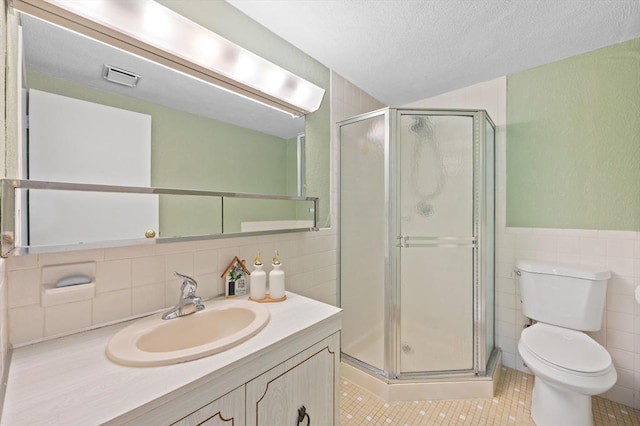 65 Commons Dr Unit 603, Shrewsbury, MA 01545 - bathroom featuring tile walls, vanity, a shower stall, tile patterned flooring, and a textured ceiling
