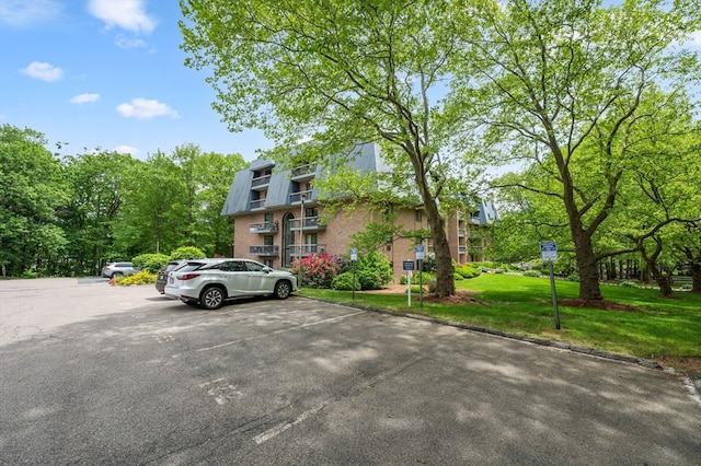 65 Commons Dr Unit 603, Shrewsbury, MA 01545 - view of property with uncovered parking