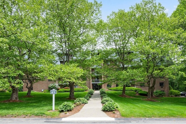 65 Commons Dr Unit 603, Shrewsbury, MA 01545 - obstructed view of property with a front yard