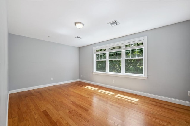 33 Oval Rd Unit 2, Quincy, MA 02170 - empty room featuring baseboards and light wood-style floors