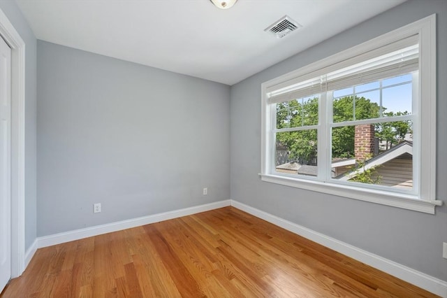 33 Oval Rd Unit 2, Quincy, MA 02170 - unfurnished room featuring baseboards and light wood-type flooring