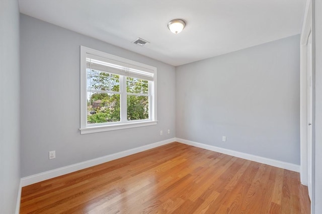 33 Oval Rd Unit 2, Quincy, MA 02170 - spare room featuring light wood-style floors and baseboards