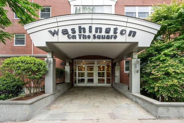 1600 Beacon St Unit 303, Brookline, MA 02446 - view of exterior entry with french doors and brick siding