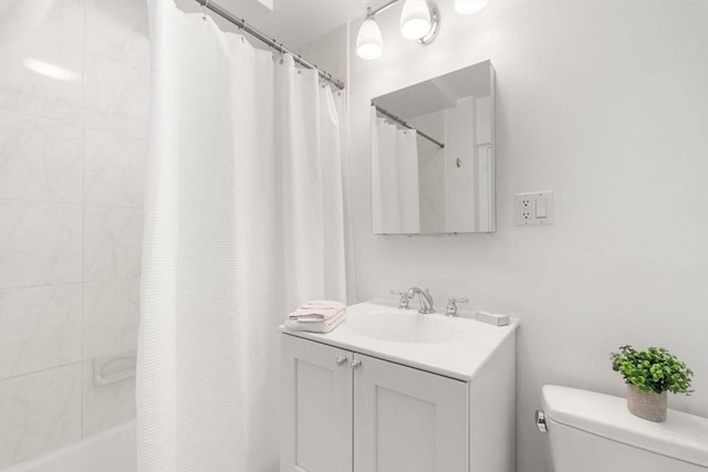 1600 Beacon St Unit 303, Brookline, MA 02446 - bathroom with toilet, vanity, and shower / bathtub combination with curtain
