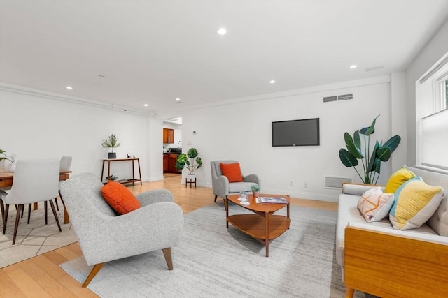 1600 Beacon St Unit 303, Brookline, MA 02446 - living area with recessed lighting, light wood finished floors, and baseboards