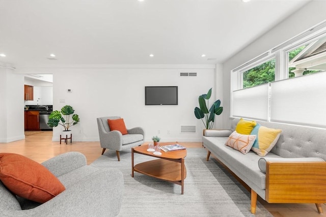 1600 Beacon St Unit 303, Brookline, MA 02446 - living room featuring recessed lighting, light wood-style flooring, and baseboards