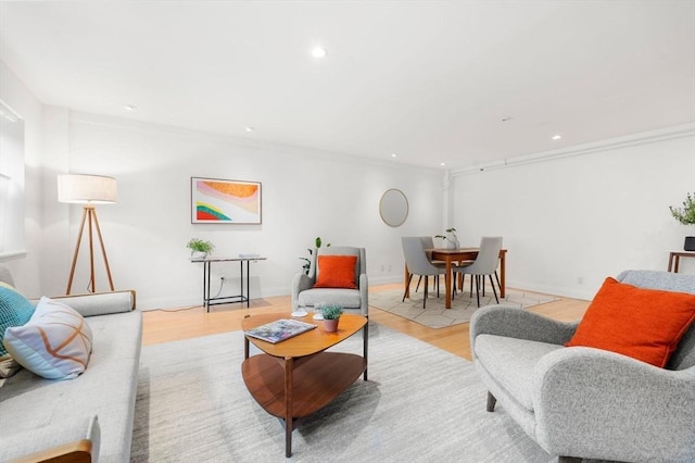 1600 Beacon St Unit 303, Brookline, MA 02446 - living room featuring light wood-style flooring, crown molding, recessed lighting, and baseboards