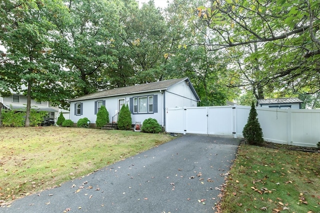 view of front of home with a front lawn