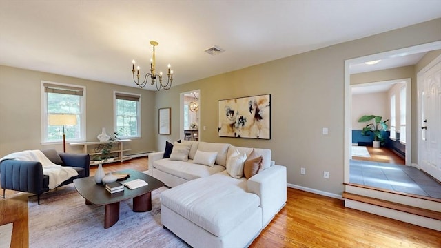 1 Ridgeway Rd, North Reading, MA 01864 - living area with a chandelier and light wood-type flooring