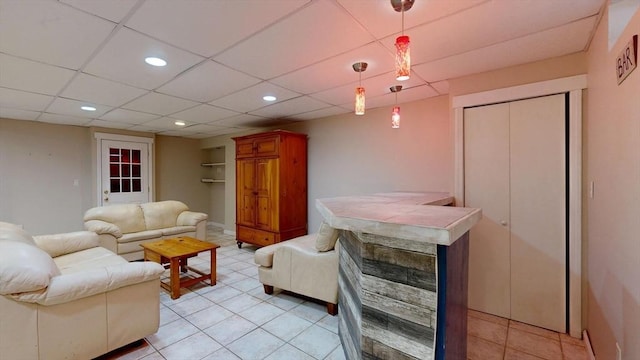 1 Ridgeway Rd, North Reading, MA 01864 - living room featuring light tile patterned floors, recessed lighting, and a dry bar