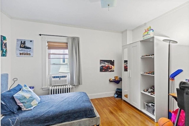 42 Carolina Ave, Boston, MA 02130 - bedroom featuring radiator heating unit, wood finished floors, ornamental molding, baseboards, and cooling unit