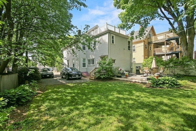 42 Carolina Ave, Boston, MA 02130 - rear view of property with a yard