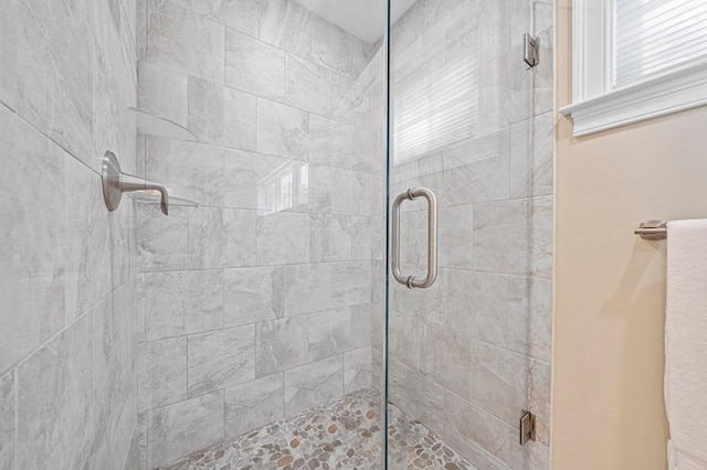 bathroom with an enclosed shower