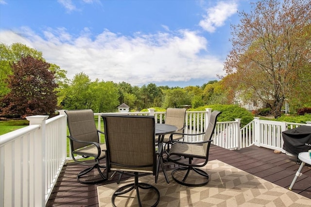 deck with outdoor dining space