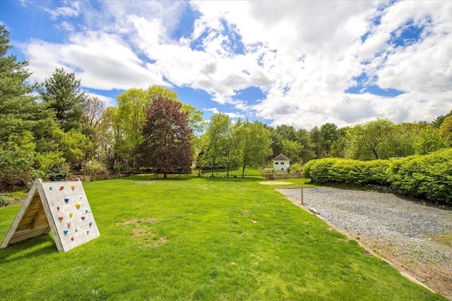 surrounding community featuring a lawn