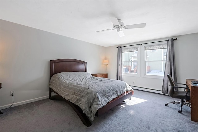 bedroom with a baseboard radiator, baseboards, ceiling fan, and carpet