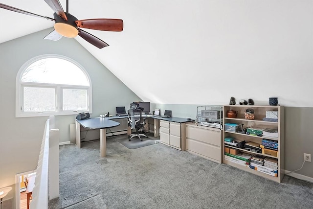 home office with a ceiling fan, carpet, and lofted ceiling