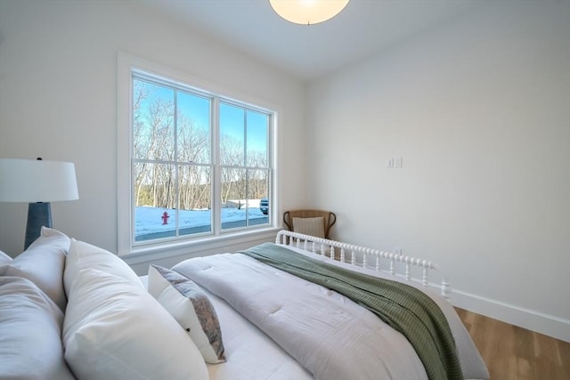 bedroom featuring hardwood / wood-style floors