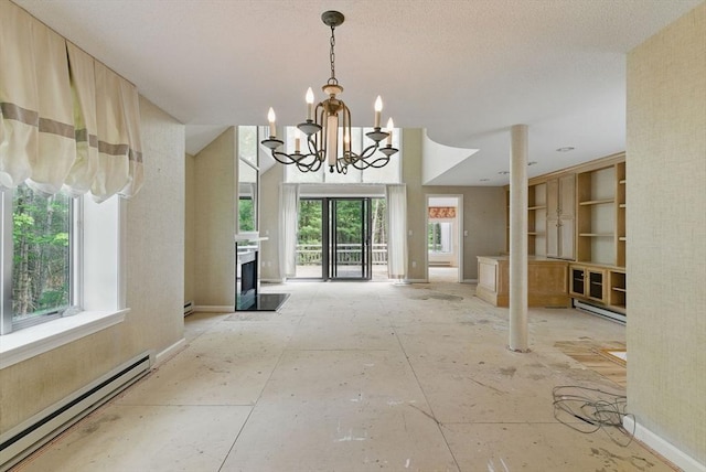 2 Hillside Dr Unit 2, Wayland, MA 01778 - unfurnished dining area featuring a baseboard radiator, a chandelier, a baseboard heating unit, and a fireplace