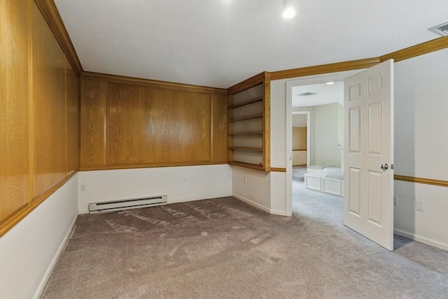 2 Hillside Dr Unit 2, Wayland, MA 01778 - unfurnished room featuring a baseboard heating unit, carpet, a textured ceiling, and baseboards