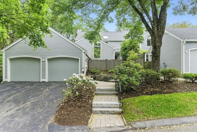 2 Hillside Dr Unit 2, Wayland, MA 01778 - obstructed view of property with driveway and a garage