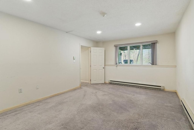 2 Hillside Dr Unit 2, Wayland, MA 01778 - unfurnished room with a baseboard radiator, carpet floors, recessed lighting, and baseboards