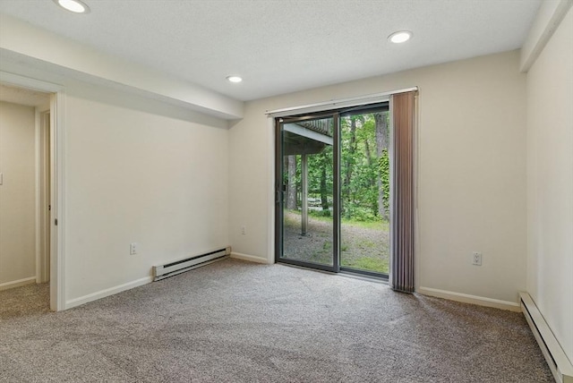 2 Hillside Dr Unit 2, Wayland, MA 01778 - carpeted empty room with baseboard heating, a baseboard heating unit, recessed lighting, and baseboards