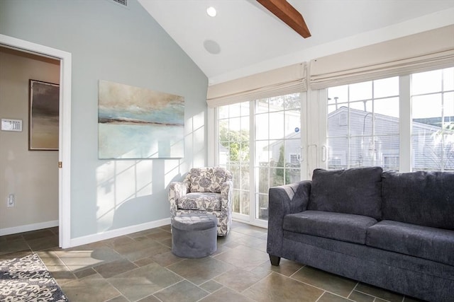 interior space with lofted ceiling with beams